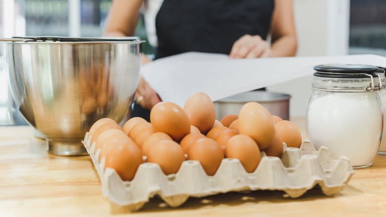 A carton of eggs on a counter