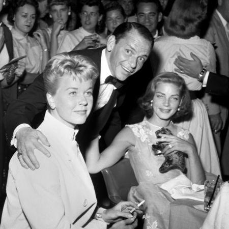 Entertainers Doris Day, Frank Sinatra (C), and Lauren Bacall (R) pose at the Sands Hotel-Casino in Las Vegas, Nevada, U.S. on September 14, 1956. Courtesy Las Vegas News Bureau/Handout via REUTERS