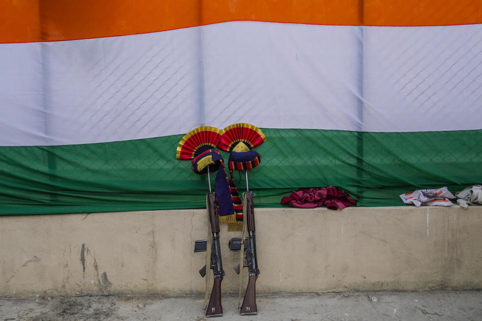Ceremonial turbans of members of a marching contingent are placed on the barrel of rifles before the start of Republic Day parade in Srinagar, Indian controlled Kashmir, Friday, Jan. 26 , 2024. (AP Photo/Mukhtar Khan)