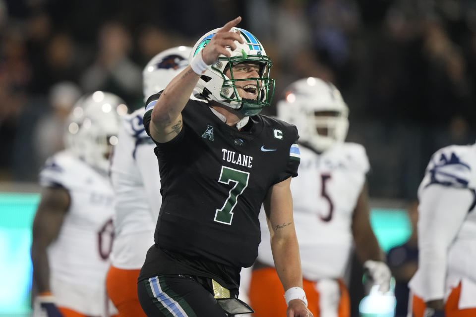 Tulane quarterback Michael Pratt (7) celebrates his touchdown pass in the second half of an NCAA college football game against UTSA in New Orleans, Friday, Nov. 24, 2023. Tulane won 29-16. (AP Photo/Gerald Herbert)