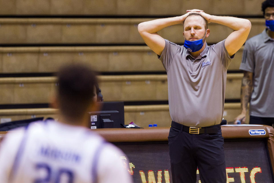 Drake head coach Darian DeVries reacts as his team falls behind in the second half of an NCAA college basketball game against Valparaiso, Sunday, Feb. 7, 2021, in Valparaiso, Ind. (AP Photo/Robert Franklin)