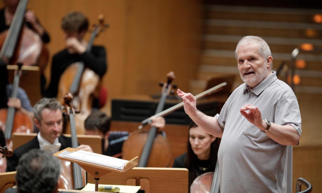 <span>Peter Eötvös rehearsing with the Royal Concertgebouw Orchestra in Cologne, 2017.</span><span>Photograph: Ullstein Bild/Getty Images</span>