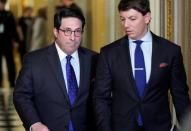 U.S. President Donald Trump's personal attorney Jay Sekulow (L) walks with White House Principal Deputy Press Secretary Hogan Gidley during a break as the impeachment trial of Trump continues in Washington