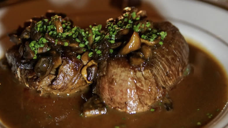 Steak Diane with mushrooms and fresh herbs