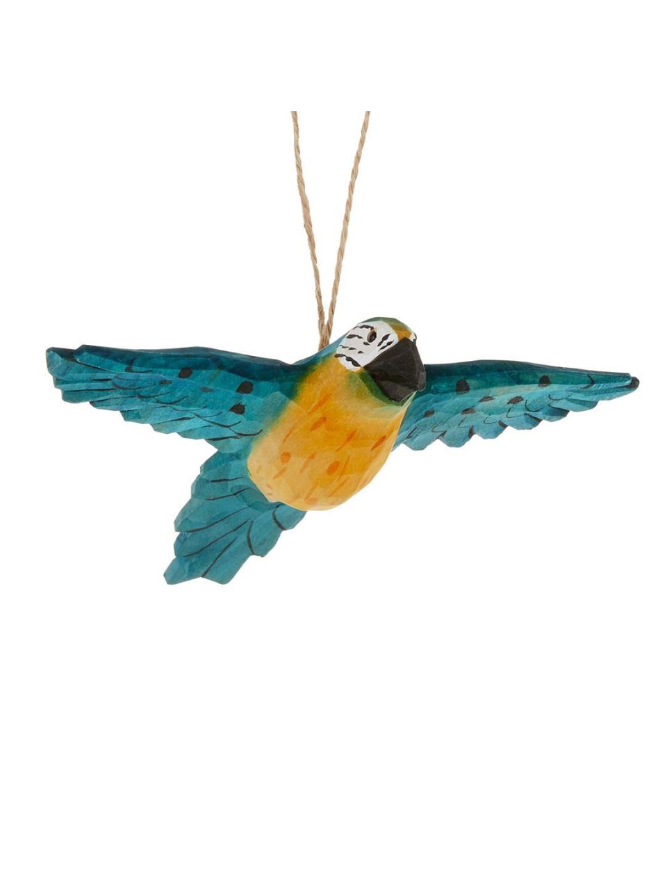 <p><a rel="nofollow noopener" href="https://www.johnlewis.com/john-lewis-partners-emerald-wooden-macaw-tree-decoration-green/p3527266" target="_blank" data-ylk="slk:BUY NOW;elm:context_link;itc:0;sec:content-canvas" class="link ">BUY NOW</a></p><p><strong>Emerald Wooden Macaw Tree Decoration, Green, £8, John Lewis & Partners</strong></p>