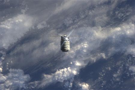 The unmanned U.S. commercial cargo ship Cygnus is seen approaching the International Space Station in this September 29, 2013 handout photo by NASA. REUTERS/NASA TV/Handout via Reuters