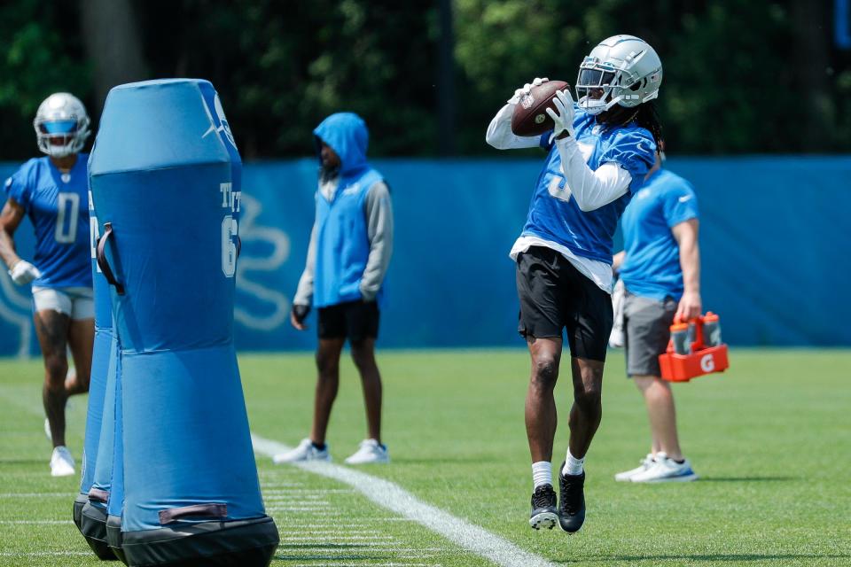 Lions wide receiver Jameson Williams makes a catch during minicamp at in Allen Park on Wednesday, June 7, 2023.