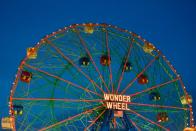 <p><a href="https://www.denoswonderwheel.com/history/" rel="nofollow noopener" target="_blank" data-ylk="slk:The Wonder Wheel;elm:context_link;itc:0;sec:content-canvas" class="link ">The Wonder Wheel</a> has a long history: it was invented by Charles Hermann and was built from 1918-1920 by the Eccentric Ferris Wheel Company. It opened on Memorial Day in 1920. It's one of the oldest and most cherished rides in Coney Island, and was named an official New York City landmark back in 1989. It's another ferris wheel that isn't the tallest or most extravagant, but its backstory makes it something special. </p>