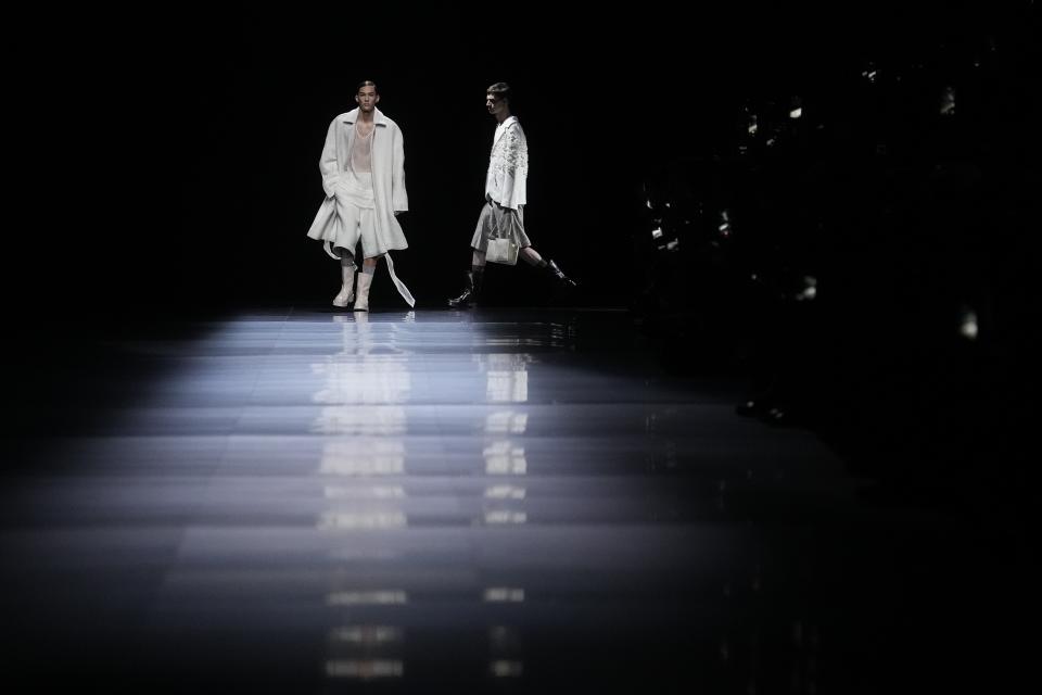 Models wear creations as part of the Dior menswear Fall-Winter 2023-24 collection presented in Paris, Friday, Jan. 20, 2023. (AP Photo/Thibault Camus)