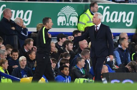 Crystal Palace manager Alan Pardew talks with fourth official Kevin Friend. Everton v Crystal Palace - Premier League - Goodison Park - 30/9/16. Reuters / Anthony Devlin Livepic