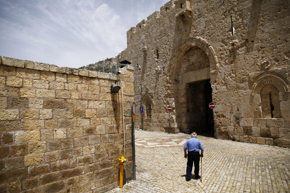 A man walks near Zion Gate in Jerusalem's Old City. (Photo: Nir Elias/Reuters)