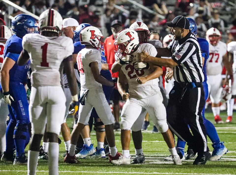 Action from the Immokalee at Barron Collier football game, Friday, September 23, 2022. 