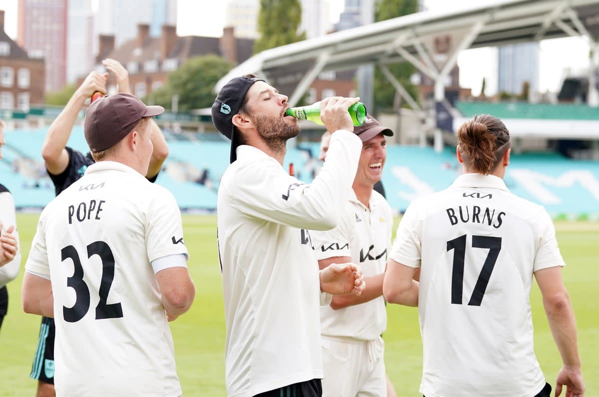 Ben Foakes celebrates as Surrey sealed the Division One title (Adam Davy/PA) (PA Wire)