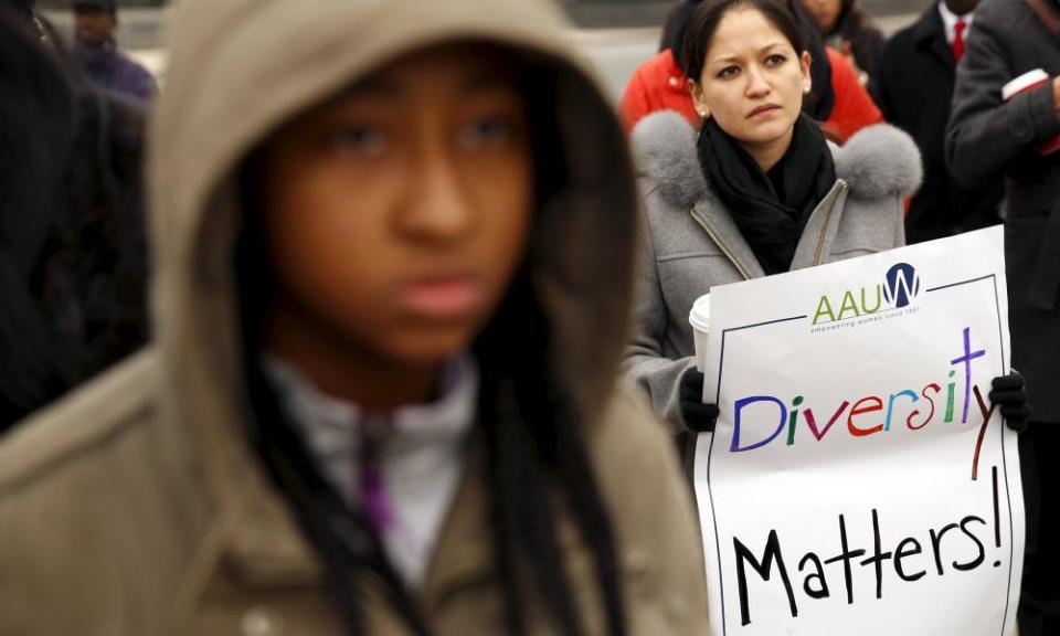 Demonstrators hold a rally at the supreme court in support of affirmative action, in Washington DC on 9 December 2015. 
