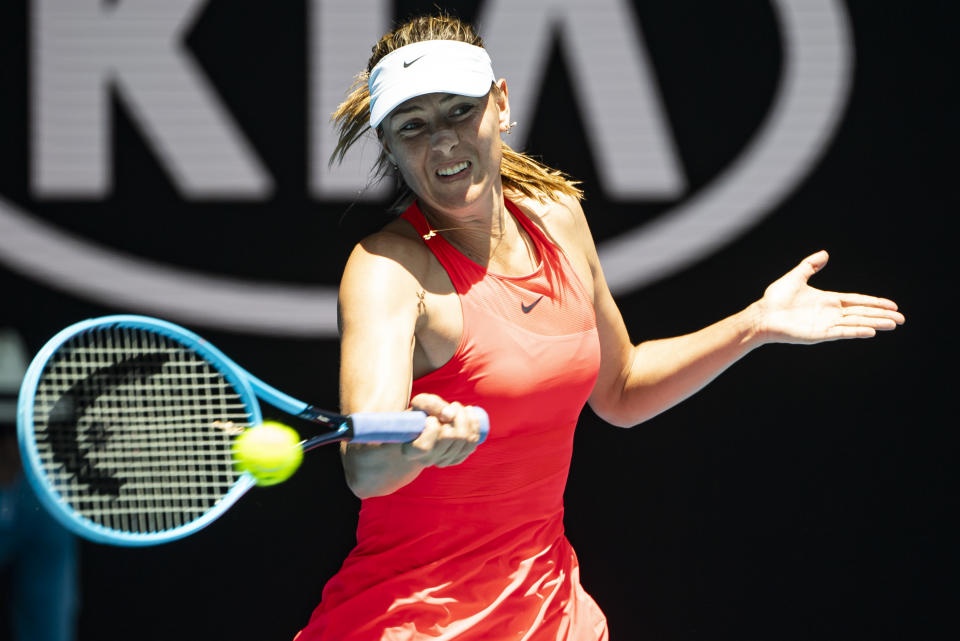 MELBOURNE, AUSTRALIA - JANUARY 21: Maria Sharapova of Russia plays a forehand in her first round match against Donna Vekic of Croatia on day two of the 2020 Australian Open at Melbourne Park on January 21, 2020 in Melbourne, Australia. (Photo by TPN/Getty Images)