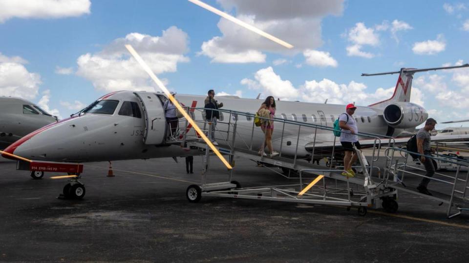 Private flyers deplane their flight at JSX Terminal in Miami, Florida, on Friday, April 21, 2023.