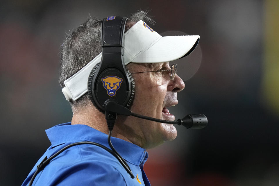 Pittsburgh head coach Past Narduzzi watches the first half of an NCAA college football game against Miami, Saturday, Nov. 26, 2022, in Miami Gardens, Fla. (AP Photo/Lynne Sladky)