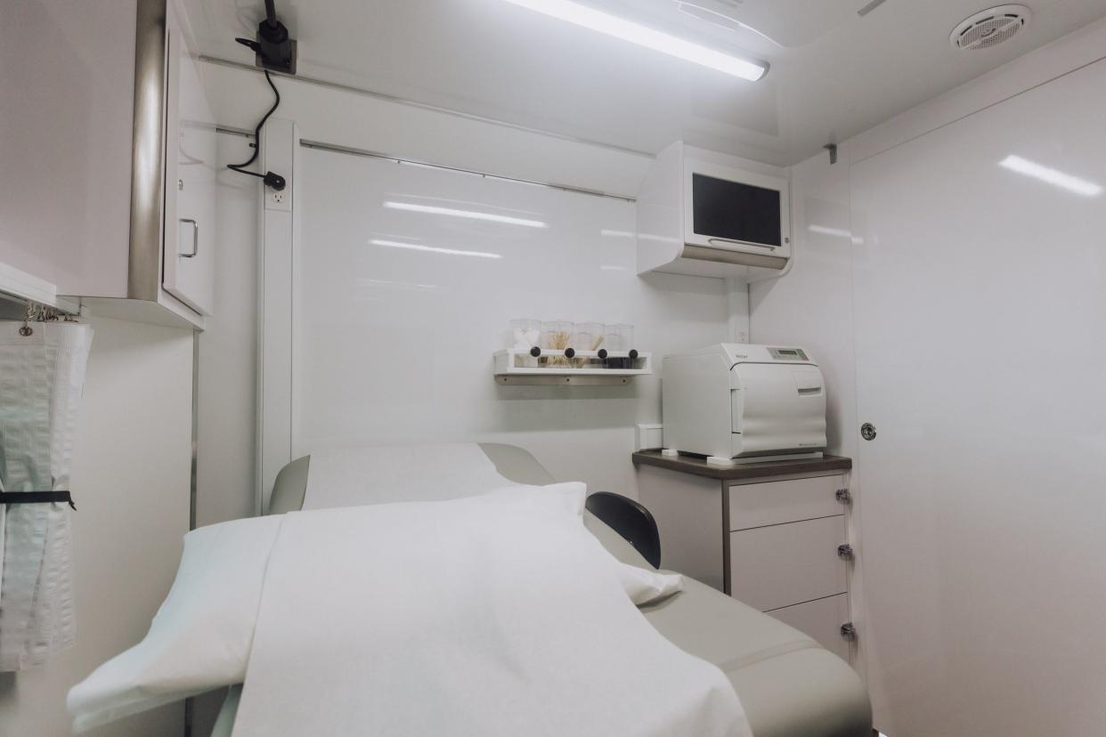 Alluvion Health's mobile medical center features three examination rooms.