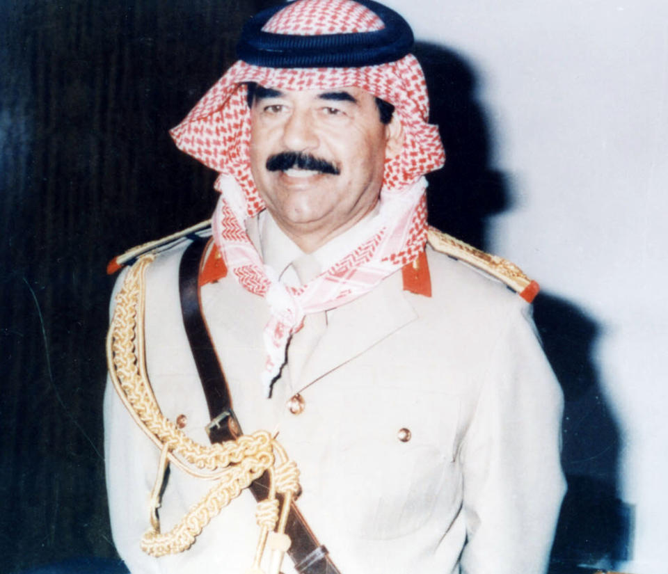 IRAQ - UNDATED:  (FILE PHOTO) Saddam Hussein poses in an undated photo.  Officials say the United States is offering a $25 million reward for any information leading to the capture of ousted Iraqi president Saddam Hussein or proof of his death.  (Photo by Getty Images)