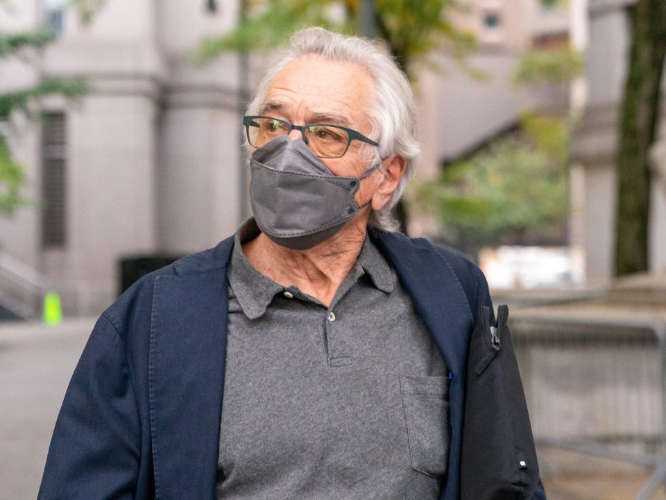 Robert DeNiro wearing mask outside a courthouse in Manhattan