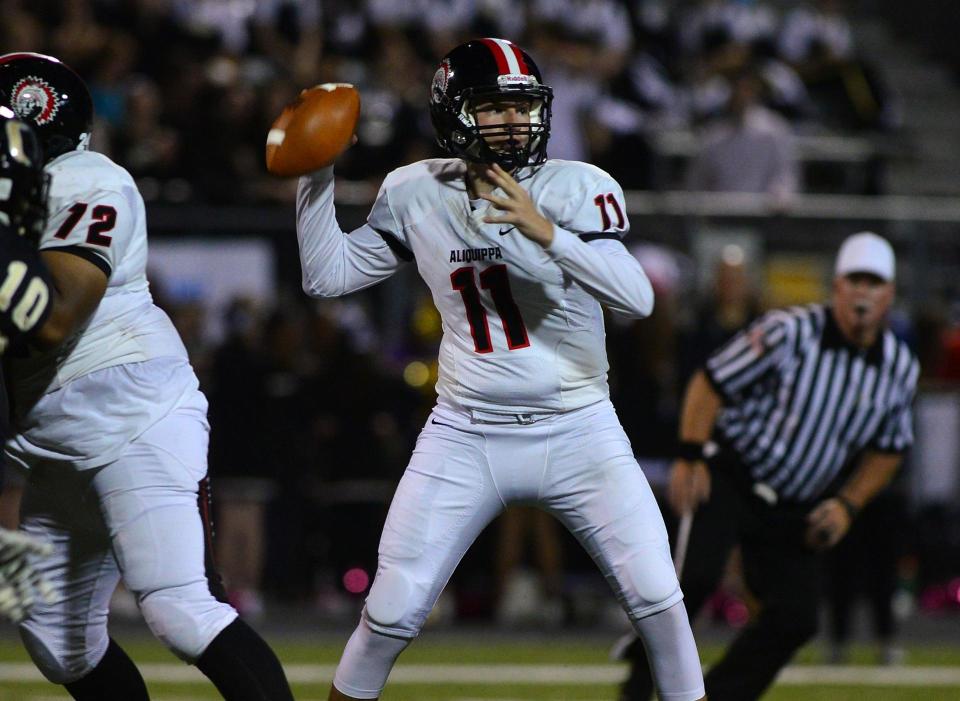 Eli Kosanovich drops back to pass in a game against Quaker Valley in 2018. Kosanovich led the Quips to a WPIAL and PIAA Championship his senior year.