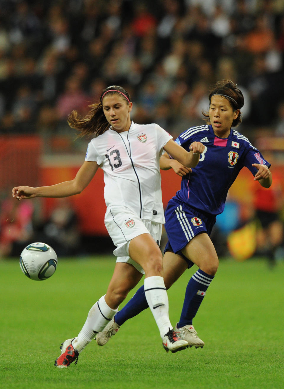 USA's striker Alex Morgan (L) and Japan's midfielder Aya Miyama vie for the ball during the FIFA Women's Football World Cup final match Japan vs USA on July 17, 2011 in Frankfurt am Main, western Germany. Japan won 3-1 in a penalty shoot-out after the final had finished 2-2 following extra-time. AFP PHOTO / CHRISTOF STACHE (Photo credit should read CHRISTOF STACHE/AFP/Getty Images)