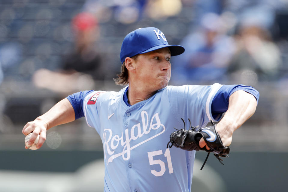 Kansas City Royals pitcher Brady Singer delivers to a Houston Astros batter during the first inning of a baseball game in Kansas City, Mo., Thursday, April 11, 2024. (AP Photo/Colin E. Braley)
