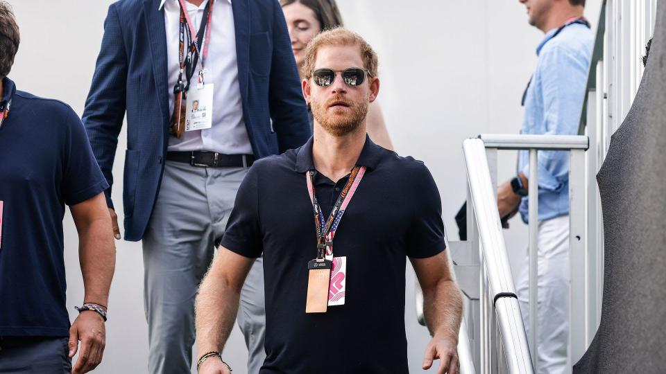Prince Harry at the F1 walking down steps