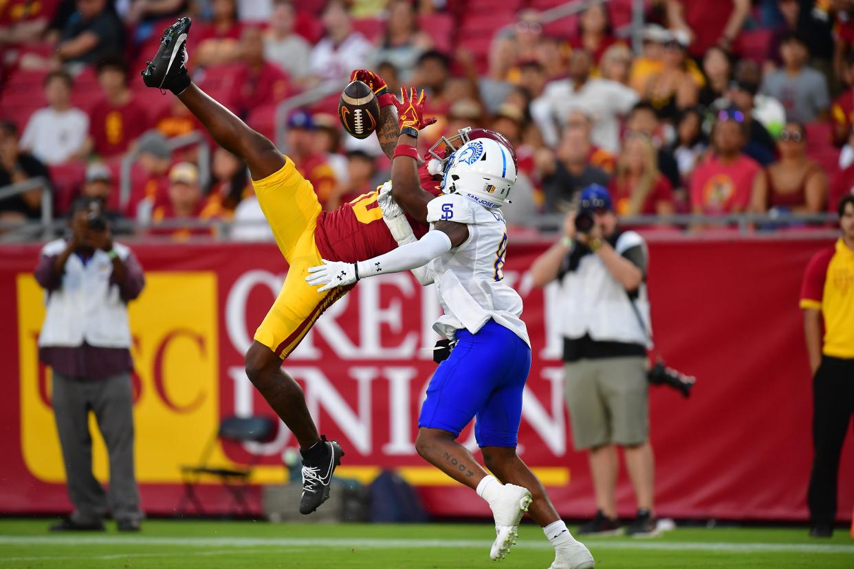 USC wide receiver Kyron Hudson is unable to make the catch against San Jose State cornerback Jay'Vion Cole during the second half of their 2023 season opener. Hudson has transferred to Texas, giving the Longhorns a needed lift in their depleted secondary.