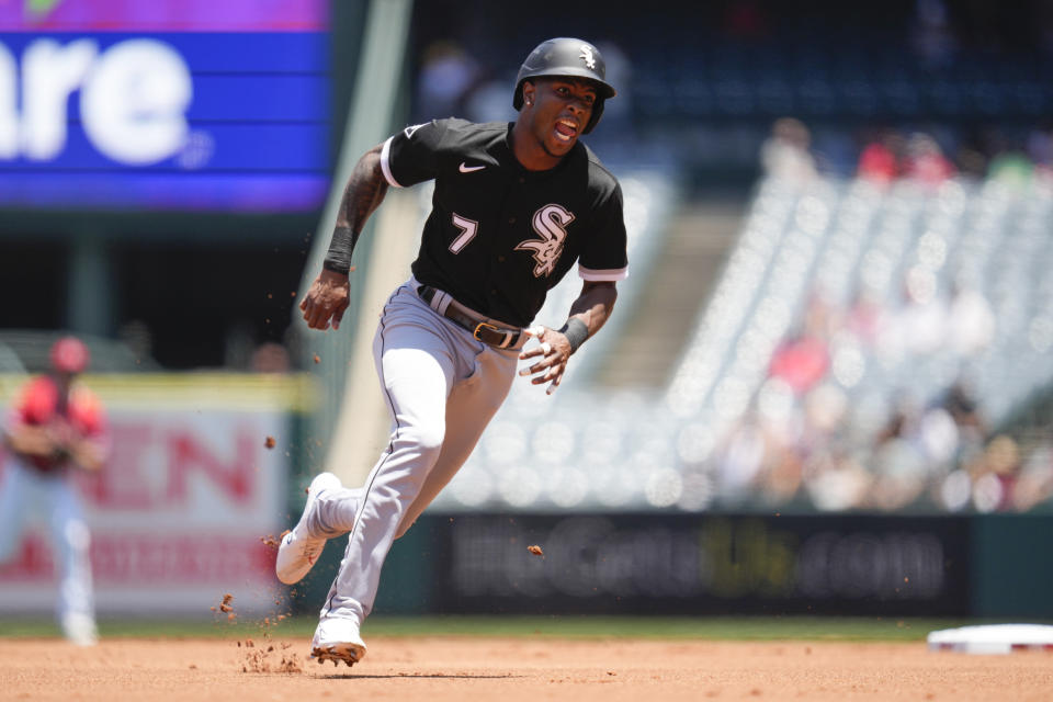 Chicago White Sox's Tim Anderson (7) runs to third on a single hit by Luis Robert Jr. during the first inning of a baseball game against the Los Angeles Angels in Anaheim, Calif., Thursday, June 29, 2023. (AP Photo/Ashley Landis)