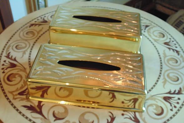 A gold tissue box