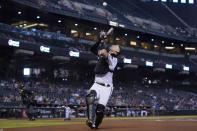 Arizona Diamondbacks catcher Carson Kelly makes a catch on a foul ball hit by San Francisco Giants' Alex Dickerson during the second inning of a baseball game, Thursday, Aug. 5, 2021, in Phoenix. (AP Photo/Ross D. Franklin)