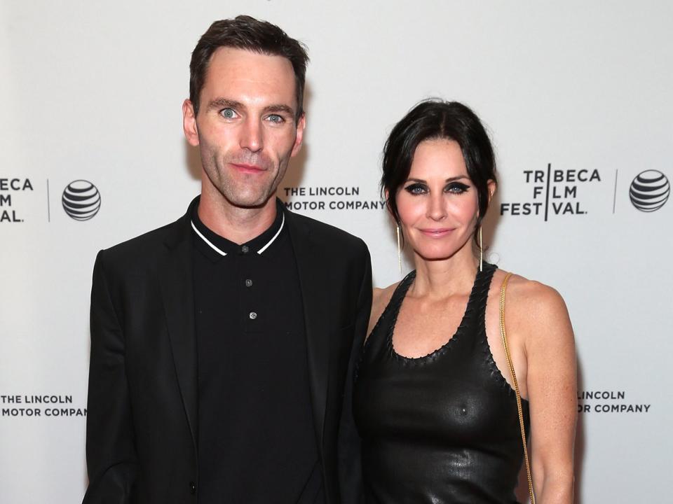 Johnny McDaid (L) and director/actress Courteney Cox attend the premiere of "Just Before I Go" during the 2014 Tribeca Film Festival at SVA Theater on April 24, 2014 in New York City