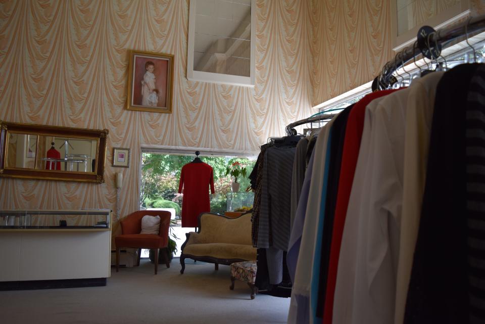 Dresses and shirts on racks in the ladies section of Hunter and Coggins, which has been run by Lucy Stella and Ann Hunter for 35 years.