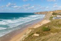 <p>Watergate Bay, one of Cornwall's most famous beaches, is about 3 miles from Newquay on the North Cornwall coast. The large, open bay is popular with surfers, thanks to the swell from the Atlantic, and is two miles long for avid walkers. </p>