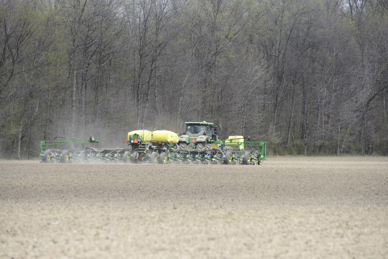 Steve Timmer plants a field of corn Wednesday near Shelby in Richland County.