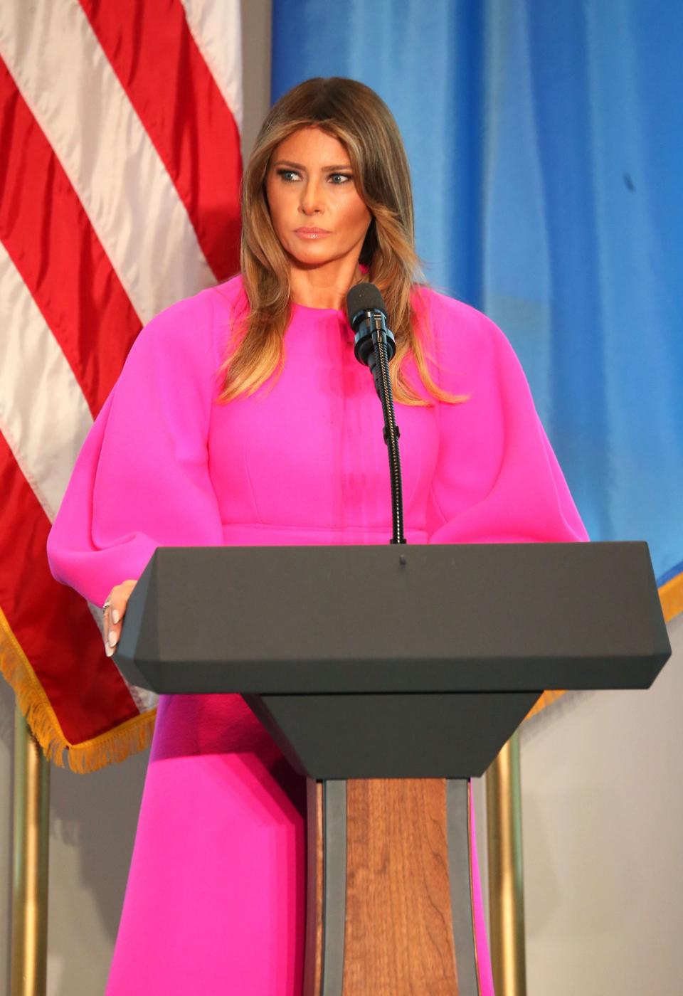 Melania wearing a £2,220 fuchsia dress from Delpozo while speaking at the United Nations in September 2017. [Photo: Rex]