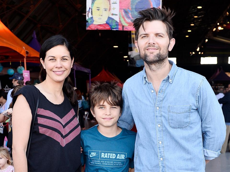 Naomi Scott, Adam Scott and son at P.S. ARTS' Express Yourself 2017 at Barker Hangar on October 8, 2017 in Santa Monica, California