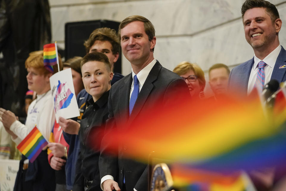 Kentucky Democratic Gov. Andy Beshear attends a rally held by Fairness Campaign to advance LGBTQ rights, Wednesday, Feb. 19, 2020, in the Rotunda at the State Capitol, Frankfort, Ky. (AP Photo/Bryan Woolston)