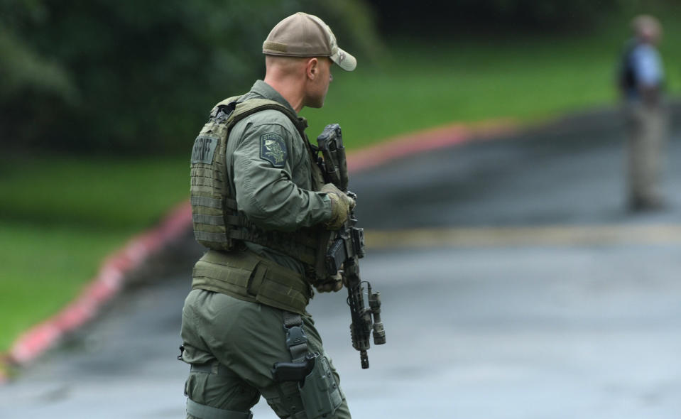 Authorities respond to a shooting in Harford County, Md., Thursday, Sept. 20, 2018. Authorities say multiple people have been shot in northeast Maryland in what the FBI is describing as an "active shooter situation." (Jerry Jackson /The Baltimore Sun via AP)