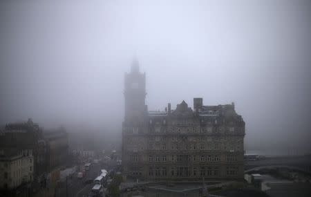 Fog surrounds the Balmoral Hotel in Edinburgh, Scotland April 30, 2014. REUTERS/Suzanne Plunkett