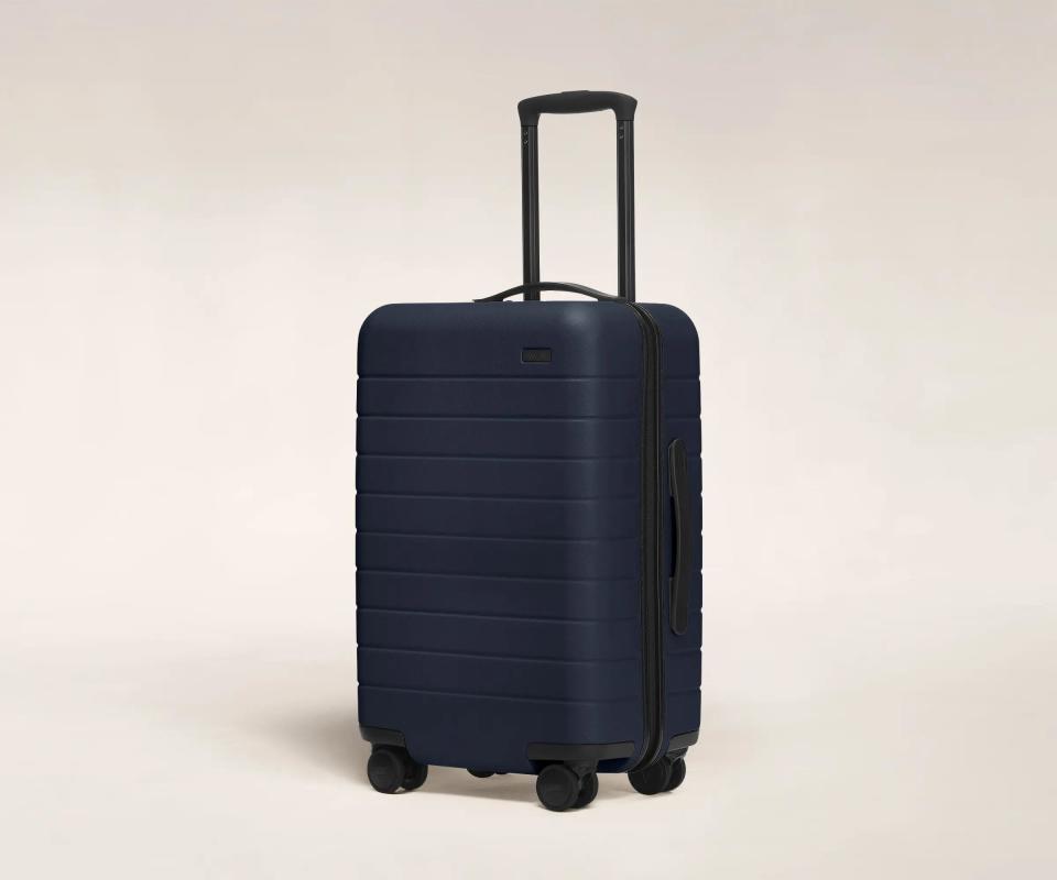<p><a href="https://go.redirectingat.com?id=74968X1596630&url=https%3A%2F%2Fwww.awaytravel.com%2Fsuitcases%2Fcarry-on%3Fcolor%3Dnavy%26affiliate_id%3D120661%26click_id%3D3910816641%26clickId%3D3910816641%26redirect-src%3D%252Fsuitcases%252Fcarry-on%252Fnavy&sref=https%3A%2F%2Fwww.thepioneerwoman.com%2Fhome-lifestyle%2Fg39516266%2Fcollege-graduation-gift-ideas%2F" rel="nofollow noopener" target="_blank" data-ylk="slk:Shop Now;elm:context_link;itc:0;sec:content-canvas" class="link ">Shop Now</a></p><p>Away The Carry-On</p><p>awaytravel.com</p><p>$275.00</p><span class="copyright">Away</span>