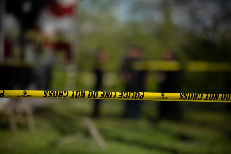 Police tape cordons of a portion of Skyline Drive as the Columbia Police Department investigates a home where Christopher Gaines, 56, and Katrina Gaines, 51, were found deceased in Columbia, Tenn., on Monday, April 18, 2022.