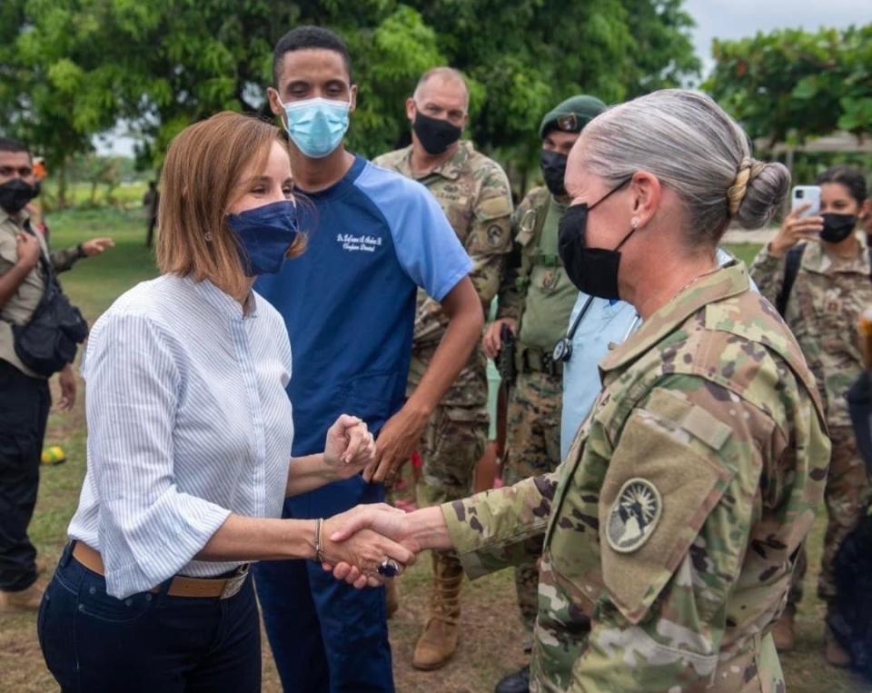 Capt. Hallie Babin meets the first lady of Panama in March in Panama during her recent ninth-month deployment in Central America.