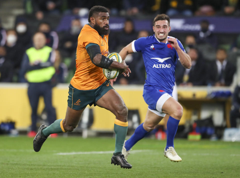 Australia's Marika Koroibete makes a run during the second rugby test between France and Australia in Melbourne, Australia, Tuesday, July 13, 2021. (AP Photo/Asanka Brendon Ratnayake)