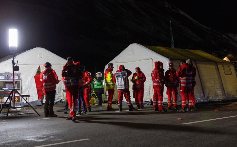 Rescuers are pictured at the Austrian ski resort of Lech Zurs after an avalanche on Dec. 25, 2022. / Credit: PETER RINDERER/EXPA /AFP via Getty Images