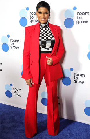 <p>Michael Loccisano/Getty Images</p> Tamron Hall attends Room To Grow's 25th Anniversary Gala in New York City.