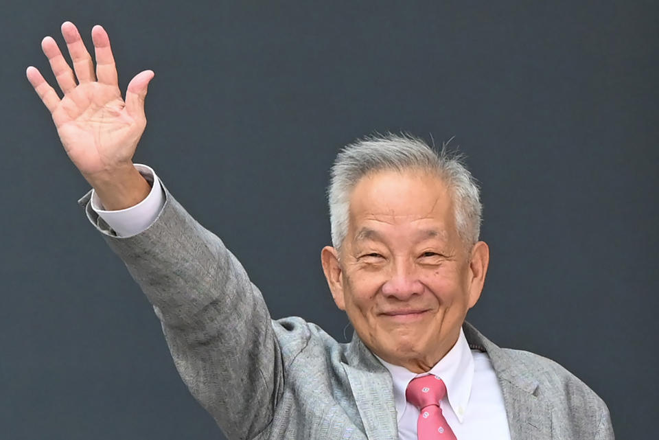 Presidential candidate Ng Kok Song waves as he arrives at the nomination centre for the 2023 Singapore presidential election. 