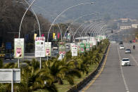 Pakistan's capital roads are decorated with portraits of Pakistani and Saudi leaders on the occasion of the visit by Saudi Arabia's Crown Prince to Pakistan, in Islamabad, Pakistan, Friday, Feb. 15, 2019. Pakistan said Wednesday that Crown Prince Mohammed bin Salman will arrive in Islamabad later this week on an official visit that is expected to include the signing of agreements for billions of dollars of investment in Pakistan. (AP Photo/B.K. Bangash)