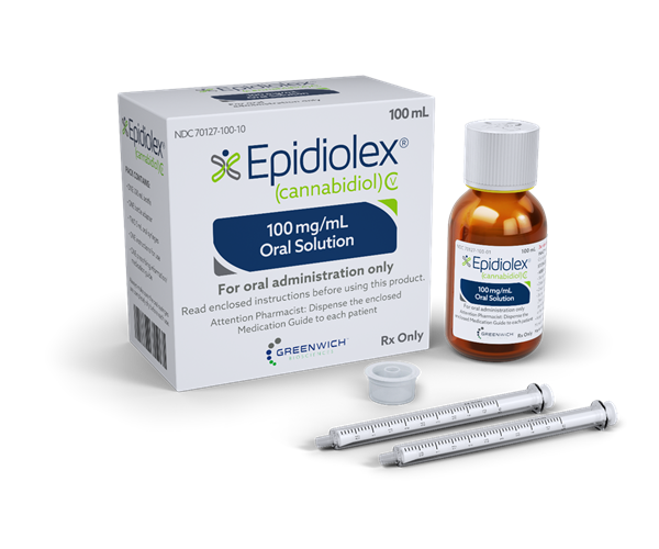 A vial of Epidiolex next to its packaging box and two droppers.